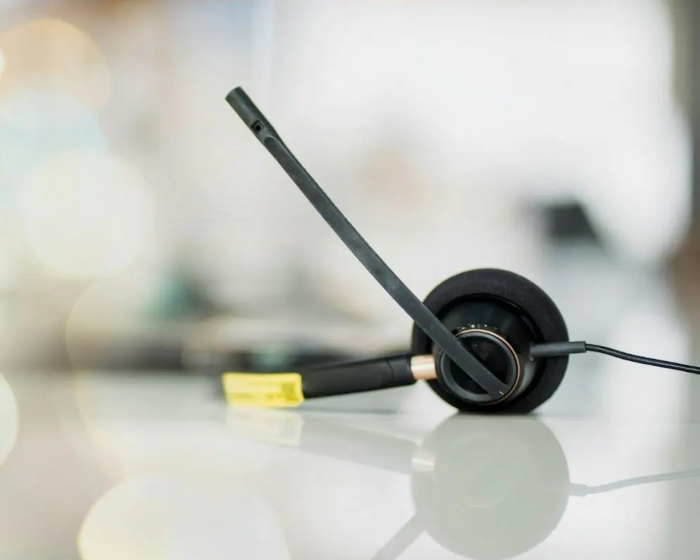 A headset resting on a desk