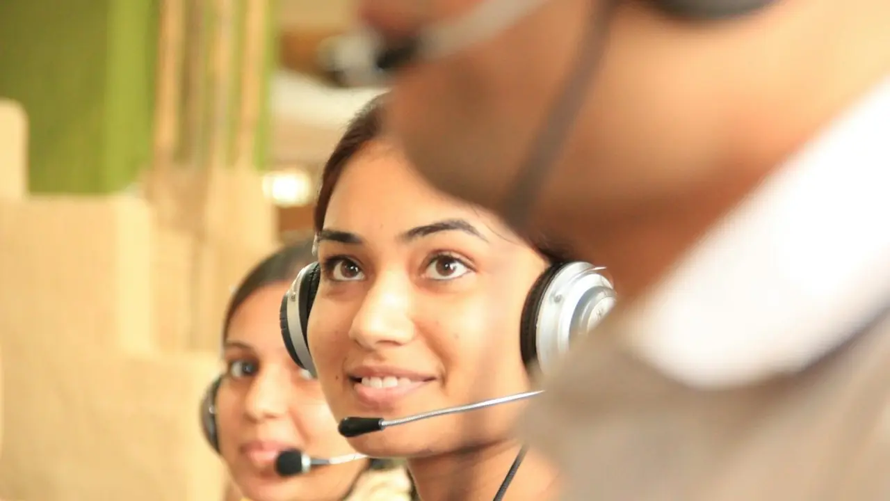Support agents on headsets at their desks