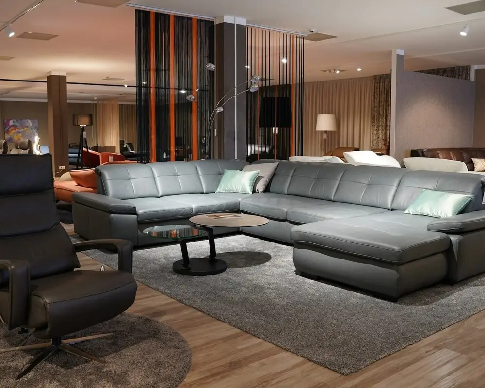 A furniture showroom with sofas and armchairs