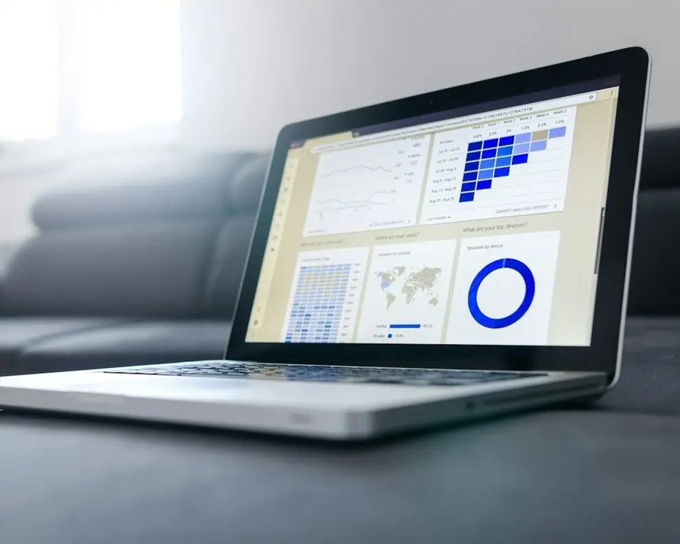 A laptop showing a reporting dashboard