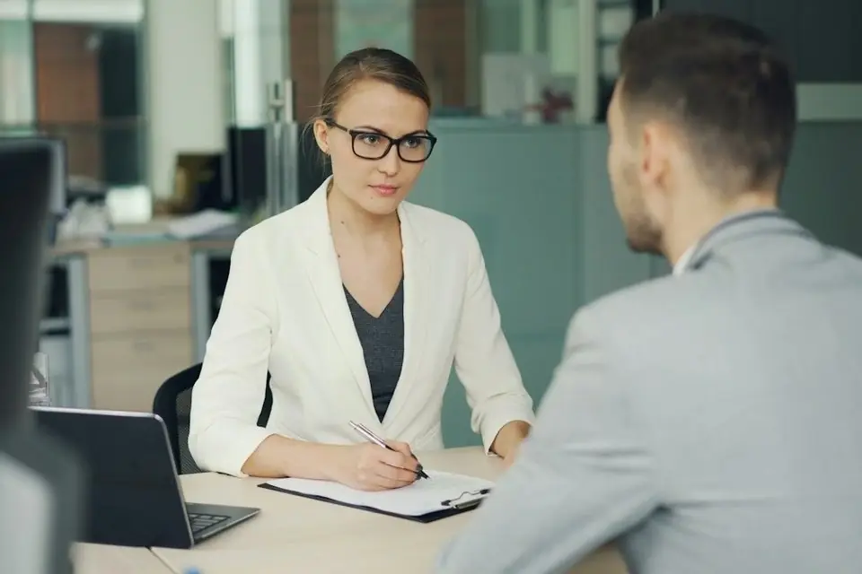 An interview at an office desk